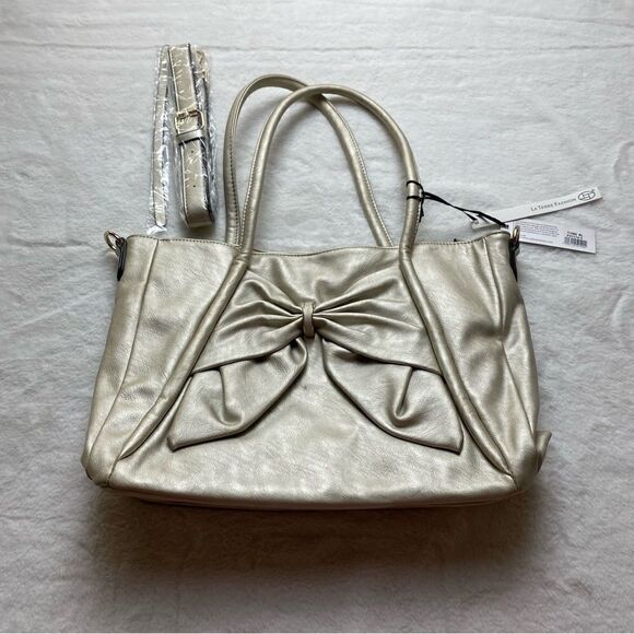 La Terre Handbags - La Terre New With Tags Metallic Pale Gold Purse
